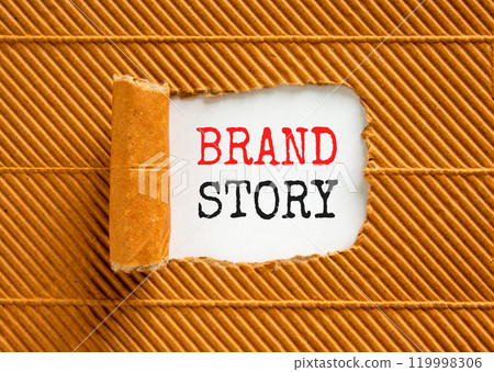 Brand story branding symbol. Concept words Brand story on beautiful white paper. Beautiful brown paper background. Business brand story branding concept. Copy space. 119998306