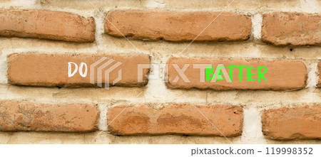 Do better symbol. Concept words Do better on beautiful brown brick wall. Beautiful brown brick wall background. Business and do better concept. Copy space. Do better symbol. Concept words Do better on beautiful brown brick wall. Beautiful brown brick wall background. Business and do better concept. Copy space. 119998352