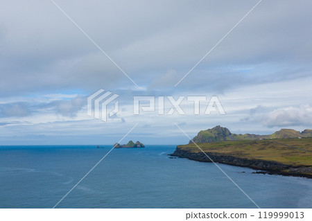 Vestmannaeyjar island beach day view, Iceland landscape. 119999013