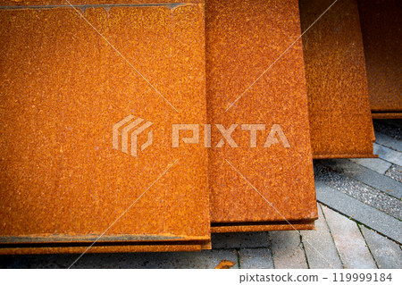 Metal decorative facade panels. Red brown and orange rust surface 119999184