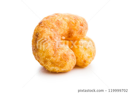 Puffed crispy Peanut flips isolated on white background. 119999702