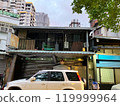 Nostalgic Taiwanese streetscape with cars and houses 119999964