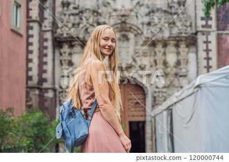Female tourist in the central square of Mexico City, Zocalo. Cultural exploration, travel, and historic architecture concept Female tourist in the central square of Mexico City, Zocalo. Cultural exploration, travel, and historic architecture concept 120000744