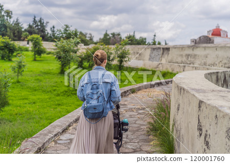 Female tourist exploring the Loreto Fort Museum in Puebla, Mexico. Cultural heritage, history, and travel exploration concept Female tourist exploring the Loreto Fort Museum in Puebla, Mexico. Cultural heritage, history, and travel exploration concept 120001760