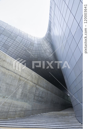 Modern building exterior featuring concrete and metal facade Modern building exterior featuring concrete and metal facade 120003641