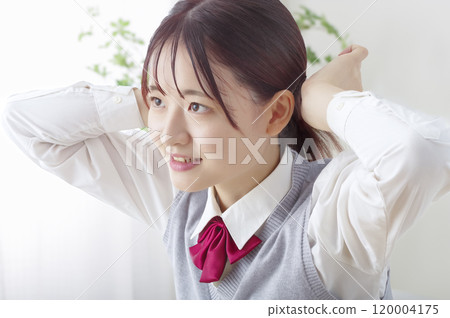 High school girl getting ready in the morning High school girl getting ready in the morning 120004175