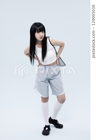 Korean Woman in 20s Poses Standing in Gray Shorts 120005016