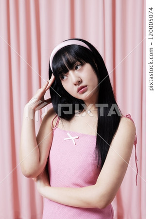 A lovely Korean woman in her 20s in a pink dress 120005074