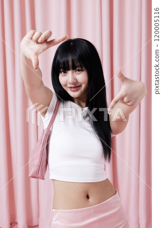 Korean Women in Their 20s Posing In White Cropped T Shirt and Pink Miniskirt 120005116