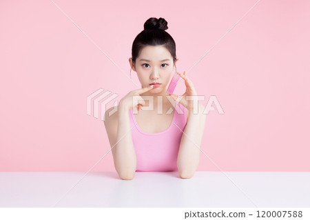 Teenage woman posing with tint 120007588