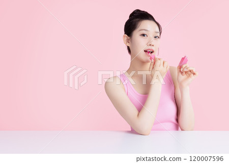 Teenage woman posing with tint 120007596