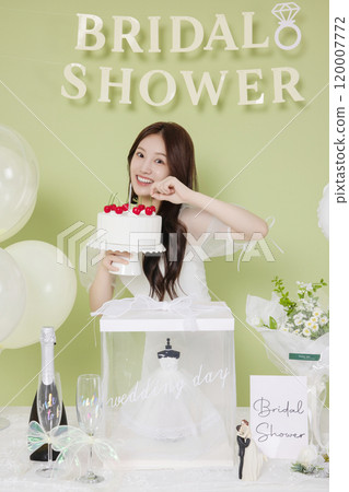 A woman in her 20s enjoying a bridal shower ahead of her wedding 120007772