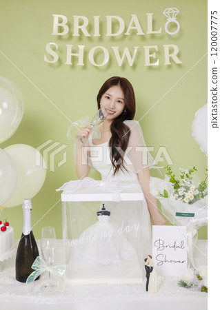A woman in her 20s enjoying a bridal shower ahead of her wedding 120007775