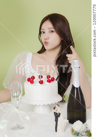A woman in her 20s enjoying a bridal shower ahead of her wedding A woman in her 20s enjoying a bridal shower ahead of her wedding 120007779