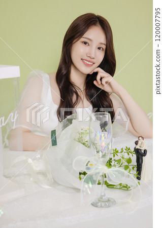 A woman in her 20s enjoying a bridal shower ahead of her wedding 120007795