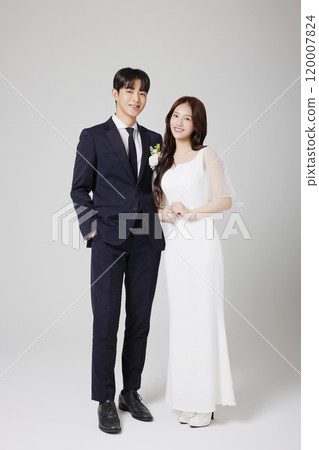 A beautiful couple in their 20s about to get married 120007824