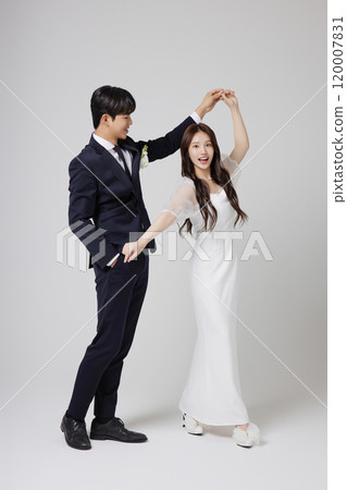 A beautiful couple in their 20s about to get married 120007831