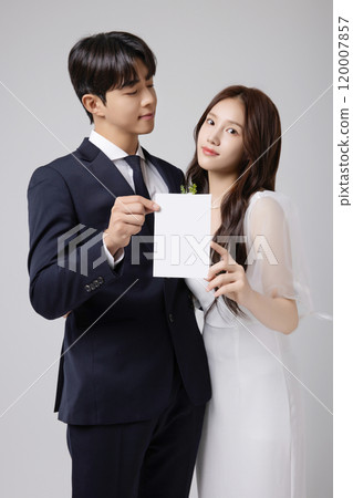 A beautiful couple in their 20s about to get married 120007857