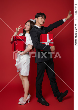 Newlyweds taking a wedding photo shoot 120007931