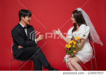 Newlyweds taking a wedding photo shoot Newlyweds taking a wedding photo shoot 120007937