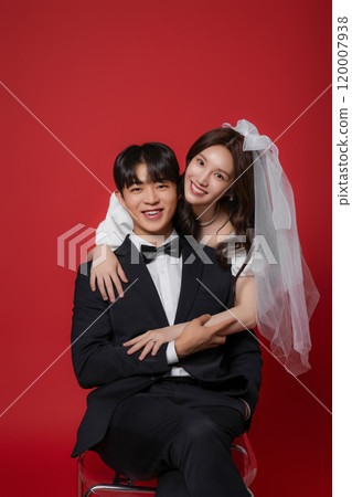 Newlyweds taking a wedding photo shoot Newlyweds taking a wedding photo shoot 120007938