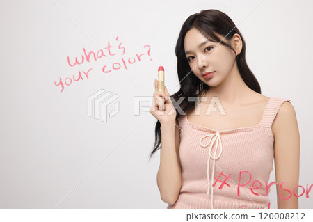 A woman in her 20s writing on a transparent wall with lipstick A woman in her 20s writing on a transparent wall with lipstick 120008212