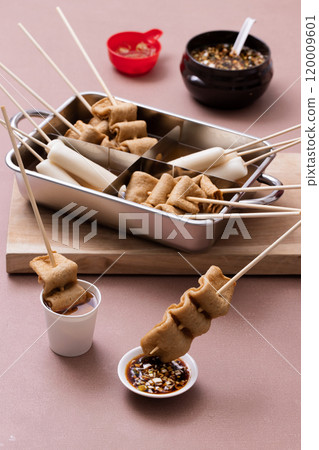 Various oden and soy sauce in a fish cake machine Various oden and soy sauce in a fish cake machine 120009601