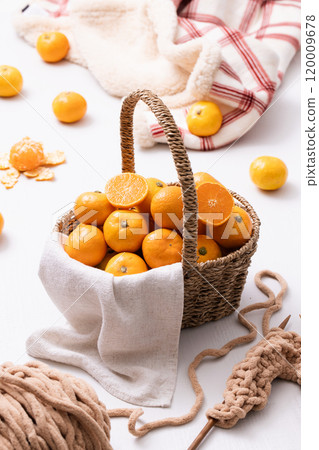 A basket full of fresh tangerines A basket full of fresh tangerines 120009678