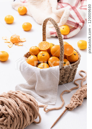 A basket full of fresh tangerines A basket full of fresh tangerines 120009680
