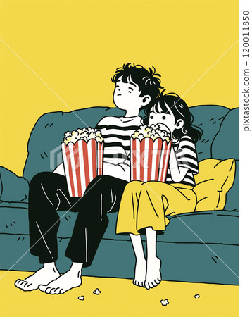 A man and a woman leaning on a sofa and eating popcorn 120011850
