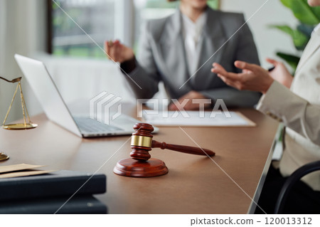 law and justice is represented by a mallet gavel of the judge, scales of justice, and books law and justice is represented by a mallet gavel of the judge, scales of justice, and books 120013312