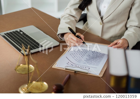 lawyer businessman working or reading lawbook in office workplace for consultant lawyer concept 120013359