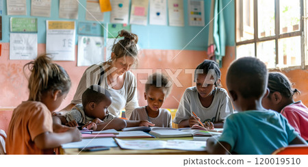 Teacher working in a classroom with African American children Teacher working in a classroom with African American children 120019510