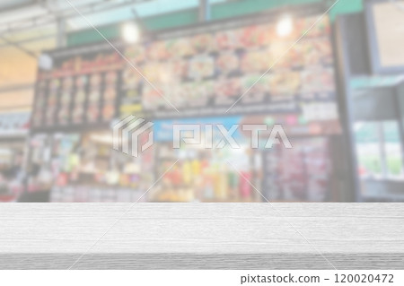 Wooden Table with White Blurred Thai Street Food Restaurant Background 120020472