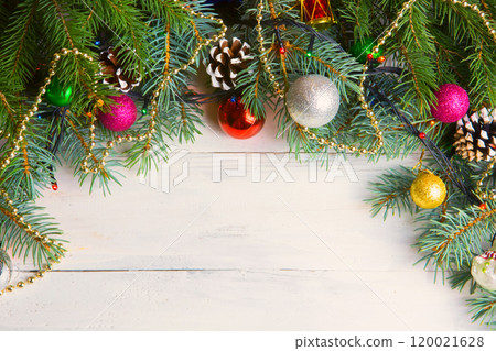 Christmas wooden background with snow branch. Top view with copy space for your text Christmas wooden background with snow branch. Top view with copy space for your text 120021628