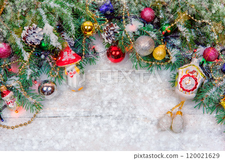 Christmas wooden background with snow branch. Top view with copy space for your text 120021629
