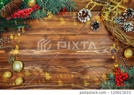 Christmas wooden background with snow branch. Top view with copy space for your text Christmas wooden background with snow branch. Top view with copy space for your text 120021633