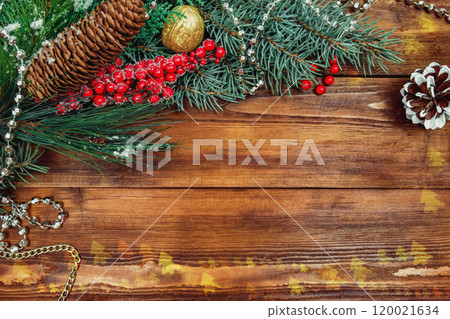 Christmas wooden background with snow branch. Top view with copy space for your text 120021634