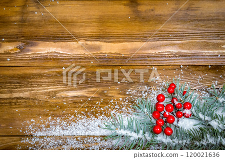 Christmas wooden background with snow branch. Top view with copy space for your text Christmas wooden background with snow branch. Top view with copy space for your text 120021636