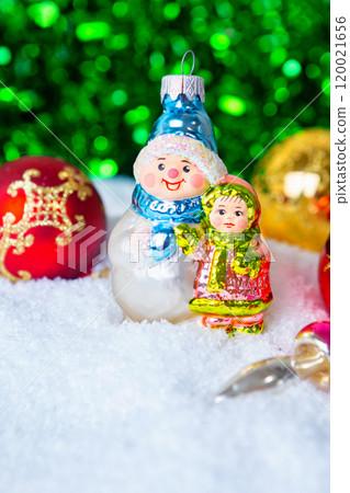 Christmas and New Year background. handmade Christmas glass toys in the snow, Christmas card. place for text. 120021656