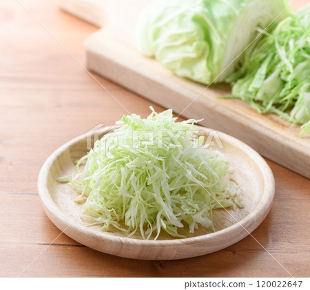 Freshly shredded cabbage (wood grain background) 120022647