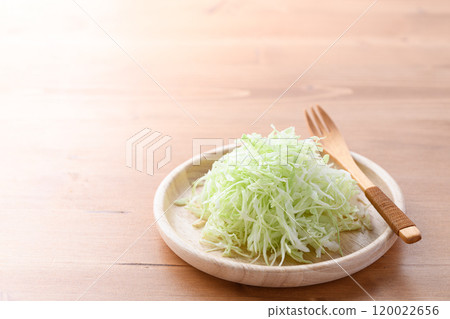 Freshly shredded cabbage (wood grain background) 120022656