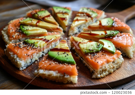 Sushi pizza with salmon and avocado on wooden board Sushi pizza with salmon and avocado on wooden board 120023036