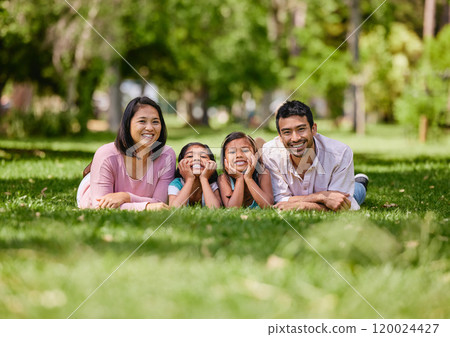 Family, park and relax in portrait for wellness or happiness, together in nature for bonding. Mixed race people, children and parents in outdoor or vacation in Europe, smile for travel with kids Family, park and relax in portrait for wellness or happiness, together in nature for bonding. Mixed race people, children and parents in outdoor or vacation in Europe, smile for travel with kids 120024427