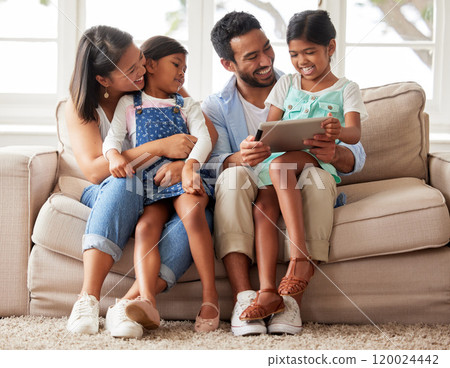 Happy family, entertainment and bonding with tablet on sofa for holiday or weekend together at home. Mother, father and children with smile in joy for love, care or support with technology at house Happy family, entertainment and bonding with tablet on sofa for holiday or weekend together at home. Mother, father and children with smile in joy for love, care or support with technology at house 120024442