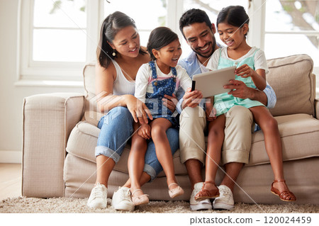 Family, parents and children on sofa with tablet for bonding, watching videos and relax in living room. Happy, house and mom, dad and kids at home with digital tech for website, internet and cartoons Family, parents and children on sofa with tablet for bonding, watching videos and relax in living room. Happy, house and mom, dad and kids at home with digital tech for website, internet and cartoons 120024459