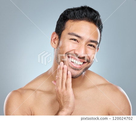 Beauty, facial and grooming with portrait of man in studio on gray background for cosmetic wellness. Dermatology, natural and skincare with face of happy person in bathroom for hydration or hygiene Beauty, facial and grooming with portrait of man in studio on gray background for cosmetic wellness. Dermatology, natural and skincare with face of happy person in bathroom for hydration or hygiene 120024702