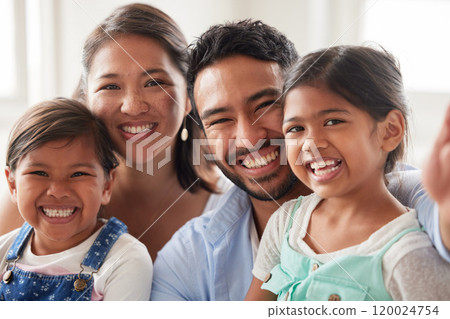 Happy family, portrait and sofa with selfie for photography, picture or memory together at home. Mother, father and young children with smile in joy for bonding, moment or weekend in relax at house 120024754