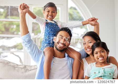 Happy family, parents and children with portrait in home for bonding, trust and support with love, security or excited. Couple, smile and playing with kids on shoulders in lounge for care and relax 120024767