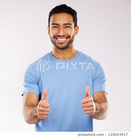 Thumbs up, smile and asian man in studio, hand gesture and emoji on white background. Thank you, yes and agreement for male person, portrait and happy face for approval and positive feedback or vote 120024917